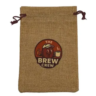 Mini burlap drawstring bag with whimsical "The Brew Crew" coffee bean logo, sustainable and reusable for car coffee aroma freshener